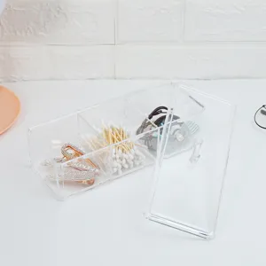 Clear acrylic storage box with lid, multi-compartment cosmetic and jewelry organizer.
