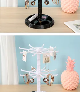 Rotating jewelry display stand for earrings, bracelets, and necklaces with multiple tiers.