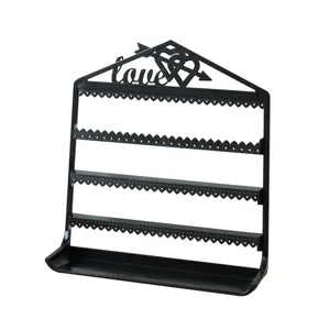 Black wall mounted jewelry organizer display stand with tiers for earrings and rings.