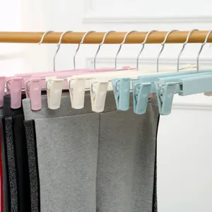 Cintres à pantalons en plastique multifonctionnels avec pinces, cintres de jupe gain de place.