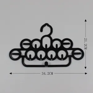 Black plastic 12-loop multi-functional hanger for ties, scarves, belts, and accessories storage.
