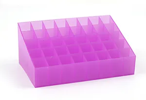 Pink plastic 40-grid lipstick organizer detail, transparent cosmetic desktop storage display shelf.