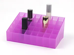 Close-up view of a purple 40-grid acrylic makeup organizer showing its stepped structure.