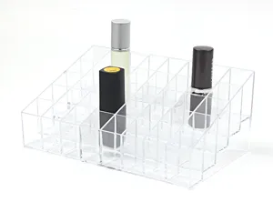 Clear acrylic 40 grid lipstick organizer cosmetic storage display stand for desktop.