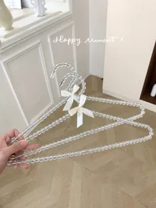 Transparante kralen kledinghanger met witte strik elegante kledinghanger voor garderobe