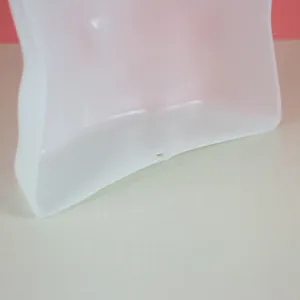 Detail view of the male mannequin chest piece, showing sturdy plastic material and hanging hole.
