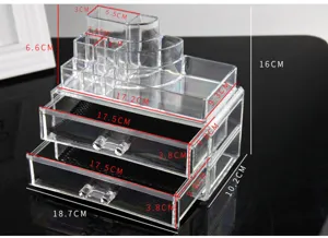 Clear acrylic makeup organizer with multiple drawers and compartments for cosmetics.