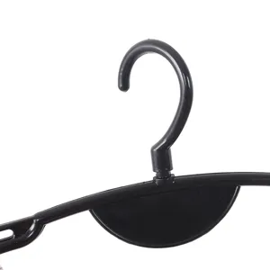 Black plastic swimsuit hanger detail view, durable hook and semicircle design for display.