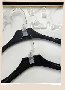 Plastic hanger connector hooks for vertical wardrobe space saving and closet organization.