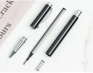 Detailed shot of disassembled metal gel pen parts, showing refill, cap, barrel and spring clearly.