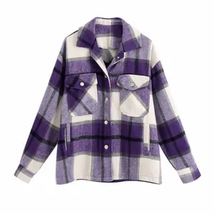 Purple and white plaid detail, featuring lapel collar, dual chest pockets and soft woolen fabric.