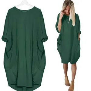 Detailed display showing the loose plus size dark green long sleeve casual dress design.