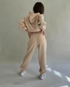 Detailed back view of casual beige hoodie and sweatpants set, perfect for everyday leisure.