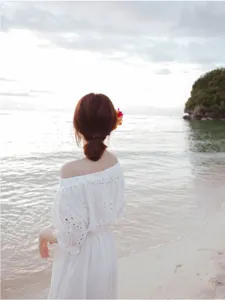 White bohemian long dress, off-shoulder beach dress for women, summer seaside vacation style.