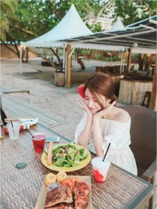 White off-shoulder bohemian beach long dress for women, perfect for summer seaside vacation.