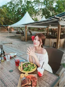 White bohemian off-the-shoulder beach dress for women, perfect for summer resort vacation style.