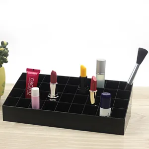 Black 36-grid makeup organizer cosmetic storage box for lipsticks and brushes display.