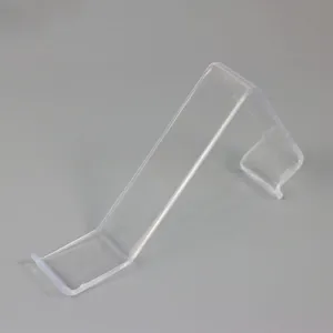 Transparante acryl schoenen display standaard detail voor winkelinrichting en presentatie.