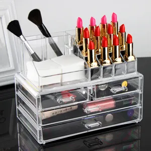 Clear acrylic makeup organizer with lipstick holder, brush slots and storage drawers for desktop.