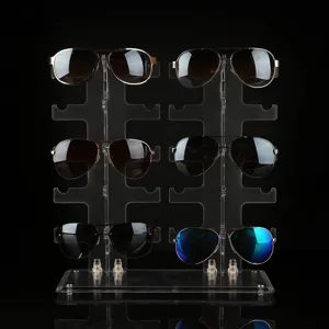 Présentoir de lunettes de soleil double rang transparent plastique pour comptoir de magasin.