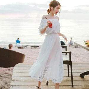 White off-the-shoulder bohemian maxi dress for women summer beach vacation and holiday wear.