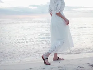 White bohemian beach long dress for women, elegant seaside vacation maxi dress with short sleeves.