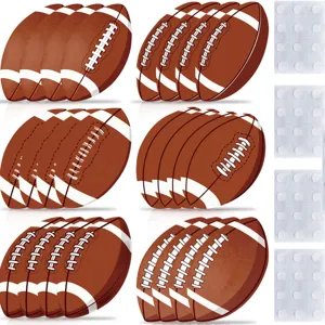 Football party game cutouts and adhesive dots detail showing quality party supply accessory components.