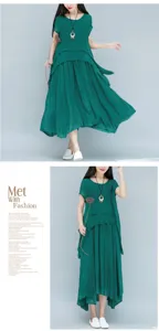 Abito midi a strati in cotone e lino verde, stile artistico casual, elegante design plissettato.