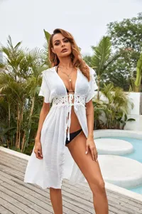 Sexy white v-neck beach cover-up for women, loose summer resort wear and bikini swimwear dress.