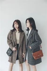 Korean style plaid woolen coat for women, thickened winter outwear with mid-length design.