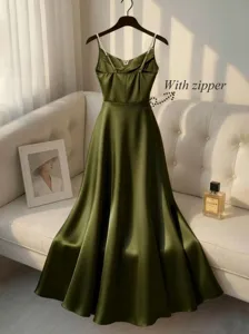 Elegant satin slip dress detail, pearl beaded straps, side zipper feature, smooth fabric.
