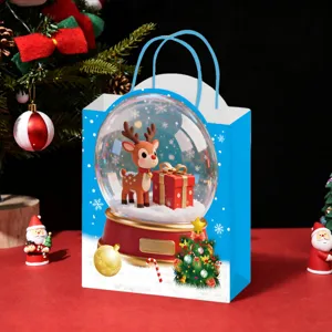 Christmas gift paper bag with cute reindeer snowglobe print, ideal for holiday presents.