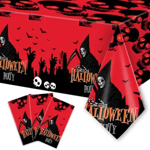 Detailed view of Halloween tablecloth featuring spooky grim reaper, skulls, and bat print patterns.