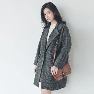 Women's mid-length grey plaid woolen coat, thick winter outerwear with lapel collar.