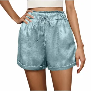 Detailed shot of light blue high-waisted satin casual shorts featuring an elastic drawstring.