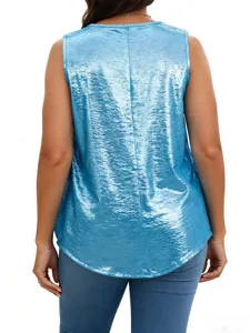 Back view of a shiny metallic sleeveless tank top in vibrant blue, paired with casual jeans.