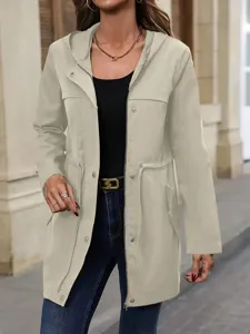 Detailed view of womens casual mid-length hooded trench coat in beige, perfect for spring.
