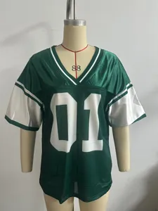 Detailed view of the American style loose football jersey with green and white patchwork design.