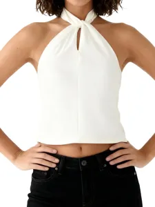 Detailed shot of white halterneck satin crop top showing fabric texture and front knot.