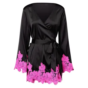 Black silk satin robe featuring vibrant pink lace trim on sleeves and hem, luxury sleepwear detail.