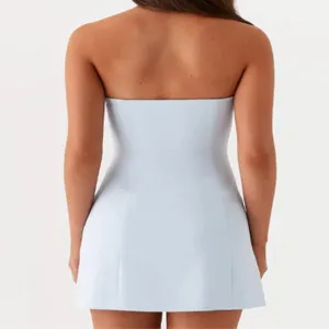 Back view of a chic strapless mini dress, elegant slim fit waist, perfect for summer.