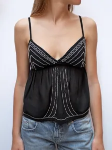 Details of the black beaded V-neck camisole top, showing intricate front embroidery work.