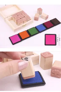 Ensemble de tampons en bois et encreurs colorés, idéal pour la déco de journal et d'album.