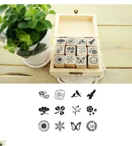 Wooden rubber stamp set with 12 natural plant and animal patterns in a cute storage box.