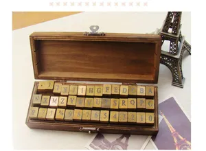 Vintage wooden stamp set with 42 pieces including alphabet letters numbers and retro storage box