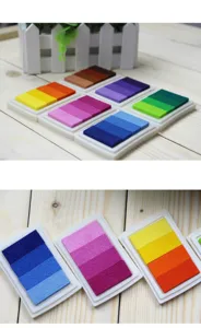 Colorful gradient stamp ink pads set with multiple bright colors for DIY craft art painting.