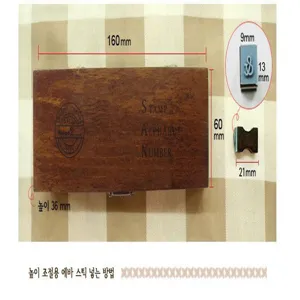 Wooden alphabet number stamp gift box set dimension detail image with 42 pieces inside.