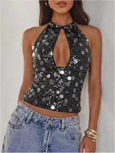 Close-up detail of a sparkling black sequin halter top featuring a stylish front keyhole.