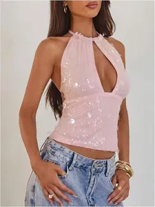 Pink sequin halter top detail showing front keyhole cutout, sleeveless style, and sparkly finish.