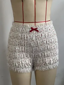 Pantaloncini corti bianchi con stampa ciliegie, volant in pizzo vita bassa sexy carini.